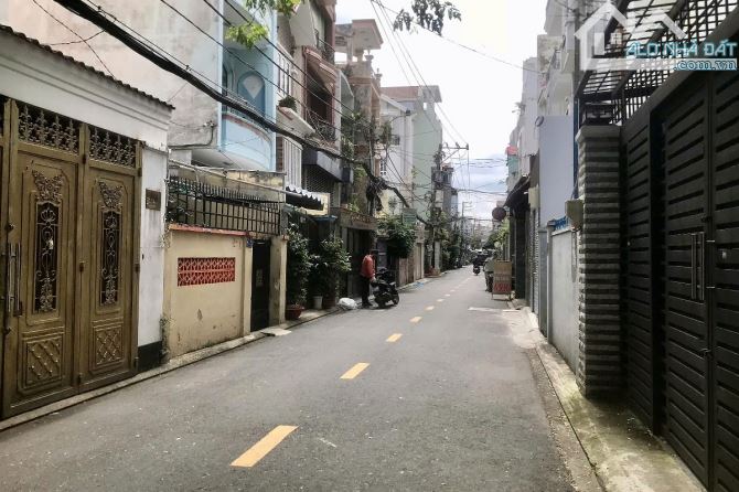 Bán gấp ở ngay, nhà 4 tầng, Q.3, hẻm xe hơi tránh nhau,Trường Sa, Sát mặt tiền !