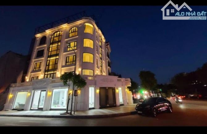 Bán tòa nhà đối diện Viện K Tân Triều, Lô Góc, MT 35m 7 tầng thâng máy - 1