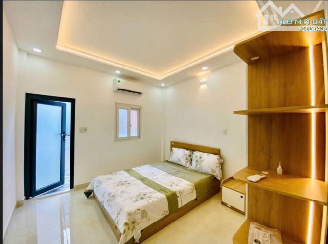 Nhà ngay trường tiểu học lê hoàn thống nhất gò vấp giá 4,68 tỷ - 2