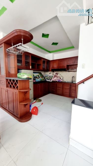 Bán nhà mt chợ Rạch Ông - 5 tầng sân thượng - 3PN - Nở hậu 5m - 3