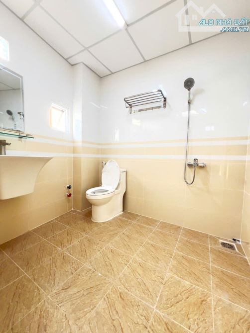 BÁN NHÀ TRỆT LẦU GÓC 2 MẶT TIỀN GẦN SIÊU THỊ AEON MALL GIÁ 1 TỶ 990 - 10