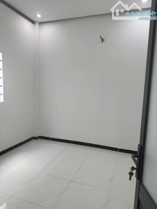 Bán gấp nhà 1 trệt 1 lửng đúc sân ôtô mặt tiền kinh doanh gần chợ Bến Cá (chợ - 2
