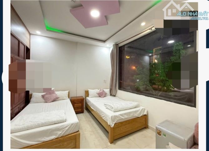 Bán tòa khách sạn mini Hòa Xuân giá tốt,dòng tiền vip