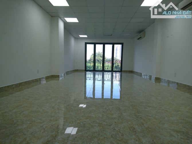 Toà nhà văn phòng 5x20m, hầm 4 tầng có thang máy ngay Lương Định Của, P. An Phú - 2