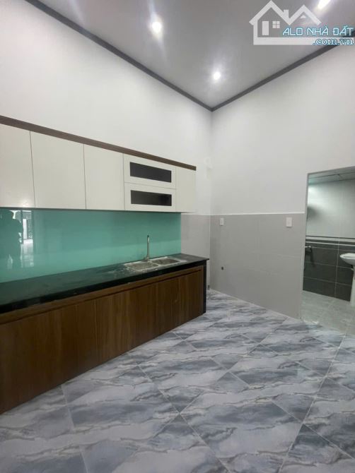 Bán gấp nhà 1 trệt lửng đúc kiên cố sân xe hơi ngay trường tiểu học Tân Phú - 2