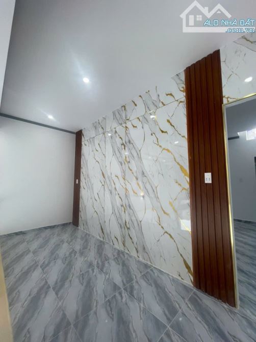 Bán gấp nhà 1 trệt lửng đúc kiên cố sân xe hơi ngay trường tiểu học Tân Phú - 4