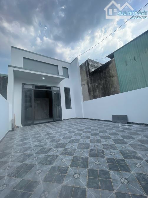 Bán gấp nhà 1 trệt lửng đúc kiên cố sân xe hơi ngay trường tiểu học Tân Phú - 7