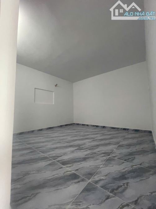 Bán gấp nhà 1 trệt lửng đúc kiên cố sân xe hơi ngay trường tiểu học Tân Phú - 8