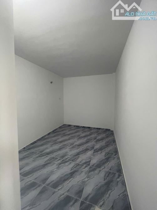 Bán gấp nhà 1 trệt lửng đúc kiên cố sân xe hơi ngay trường tiểu học Tân Phú - 9
