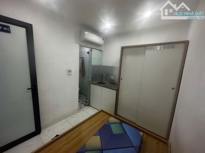 Bán tòa nhà 42m2 xây 7 tầng, 12 phòng khép kín, phố Mạc Thị Bưởi gần Times City - 1