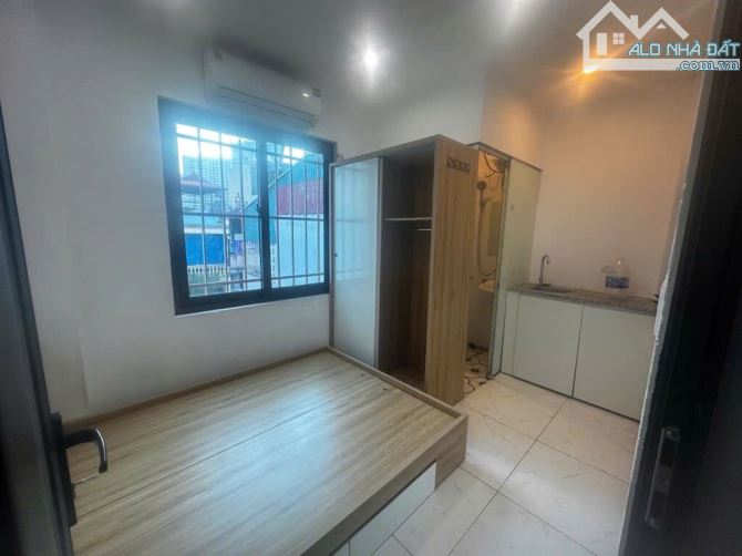 Bán tòa nhà 42m2 xây 7 tầng, 12 phòng khép kín, phố Mạc Thị Bưởi gần Times City - 2