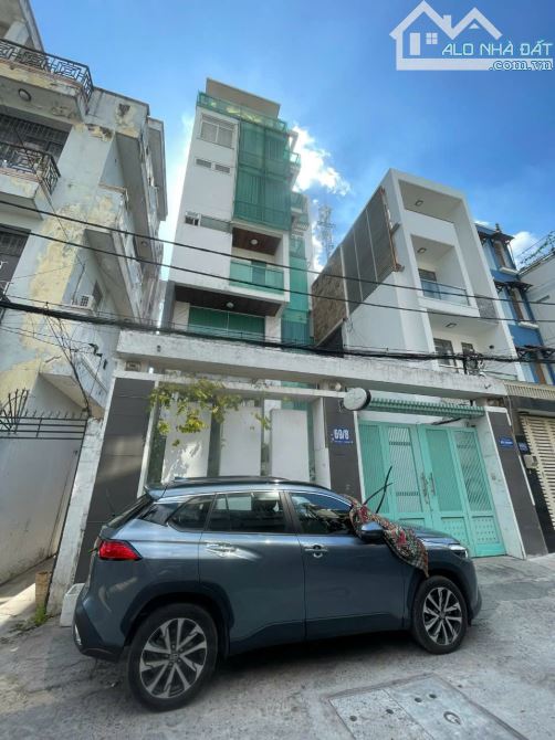 Toà nhà HXT Phan Đăng Lưu DT 8,2x26 CN 208m2 quy mô hầm 6 tầng ST giá 35 tỷ TL