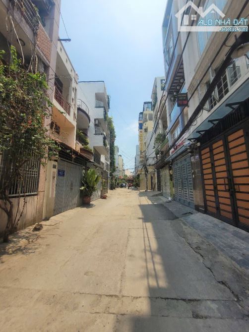 Hẻm xe tải phan văn trị ngang 8m 4 tầng có thang máy dòng tiền 65tr/tháng - 1