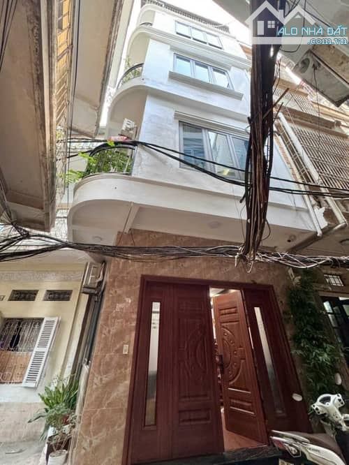 8 tỷ nhà 5tang 31m2 mt3,9m lô góc ô tô  tại đống đa - 14