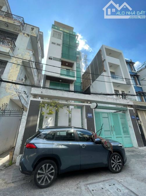 Building văn phòng hẻm phan đăng lưu dtsd 900m2 sàn 7 tầng hầm - 8