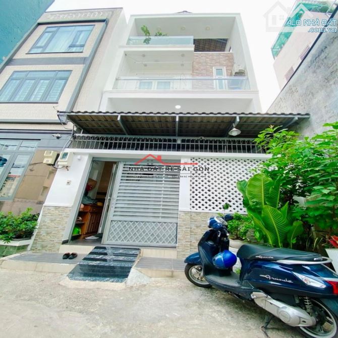 BÁN NHÀ GẦN CHỢ PHẠM VĂN HAI - 60M² - NGANG ĐẸP 5.2M - 4 TẦNG - NỞ HẬU - NHỈNH 9.X TỶ
