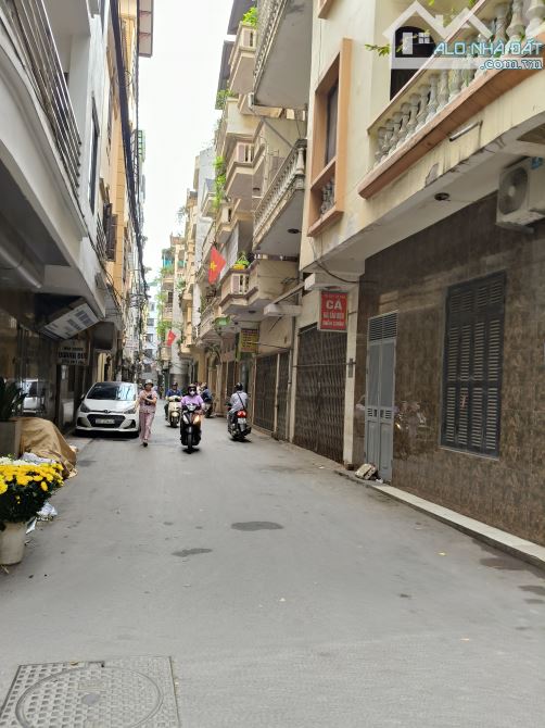 Toà nhà dòng tiền, ngõ oto thông, gần Hồ Tây. 75m2 8 tầng MT 5m sát MP, oto vào nhà - 1