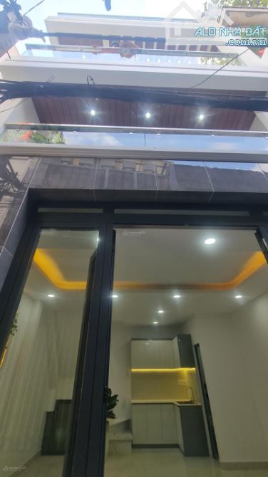 BÁN NHÀ HƯNG PHÚ QUẬN 8- NGANG 4.2M - 4 TẦNG BTCT KIÊN CÓ 1 BƯỚC RA MẶT TIỀN - NHỈNH 4 TỶ - 2