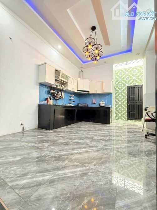 Nhà 2 tầng  lê phong Tân bình tp dĩ an  dt 70m - 3