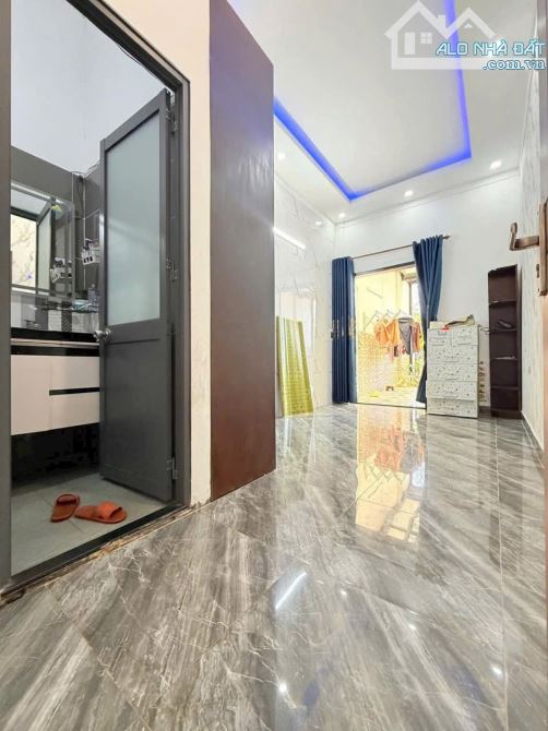 Nhà 2 tầng  lê phong Tân bình tp dĩ an  dt 70m - 4