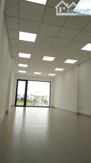 Toà nhà văn phòng 4x20m, hầm 4 tầng sàn trống ngay Lương Định Của, P. An Phú - 5