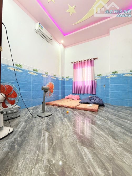 Nhà 2 tầng  lê phong Tân bình tp dĩ an  dt 70m - 7