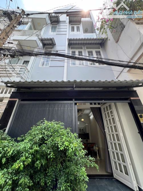 NHÀ 3LẦU MỚI HXH ĐƯỜNG NƠ TRANG LONG , P7 , QUẬN BÌNH THẠNH