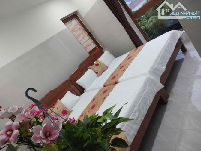 Bán nhà 4 tầng 12 phòng giá tốt đường 10m5. Cẩm Lệ gần Phong Bắc. Dòng tiền ổn định.