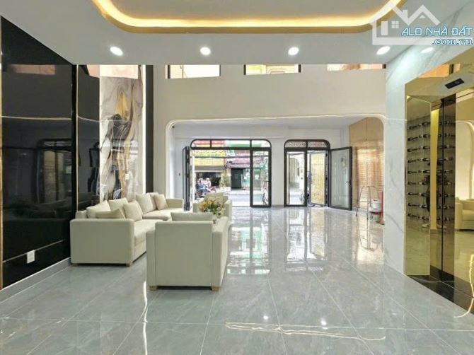 Bán nhà MT Dương Quảng Hàm Q.Gò Vấp - 11x50m - XD Hầm 8 tầng - HĐT 100tr giá chỉ 90 tỷ.