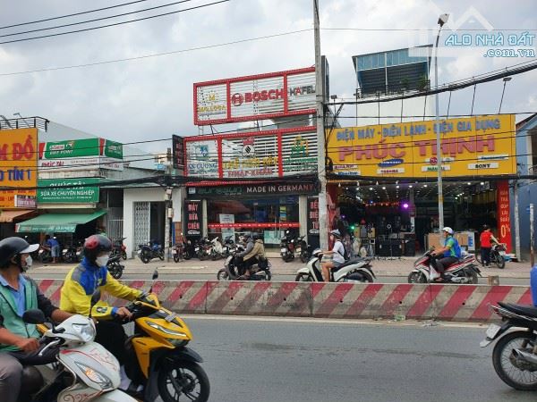 Bán nhà ngay ngã 4 Huỳnh Tấn Phát, Phú Thuận, diện tích 6*24m. Tiện xây căn hộ dịch vụ