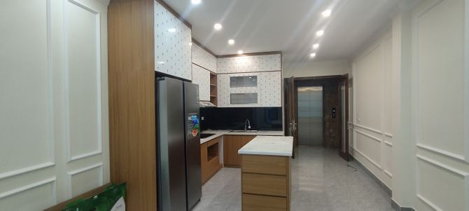 Cần bán gấp nhà phân lô khu VIP phố Nguyễn văn Huyên 45m2, 7T, thang máy, vừa ở vừa kinh d - 2