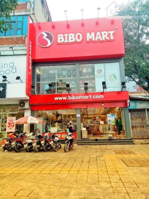 Cho thuê cửa hàng mặt tiền 6m mặt phố ngã tư Cầu Giấy Xuân Thủy 130m2,60t - 1