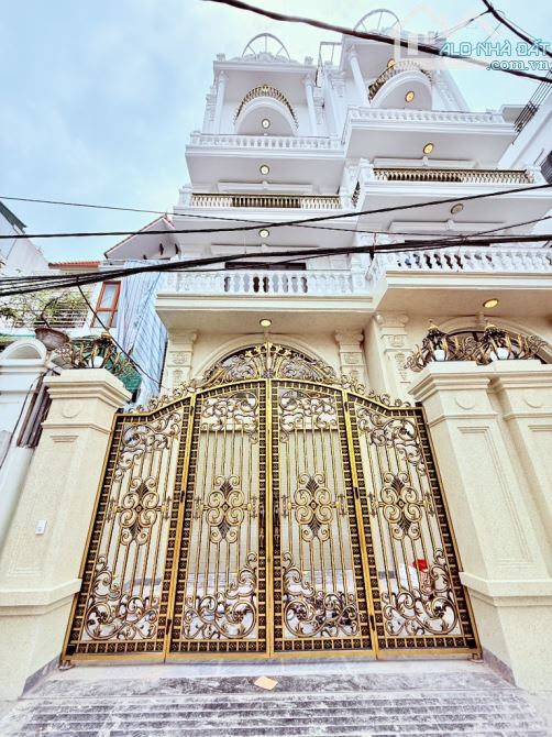 Bán nhà bát khối 61/80m2 xây 7 tầng , thang máy gara ôtô vỉa hè đá bóng - 1