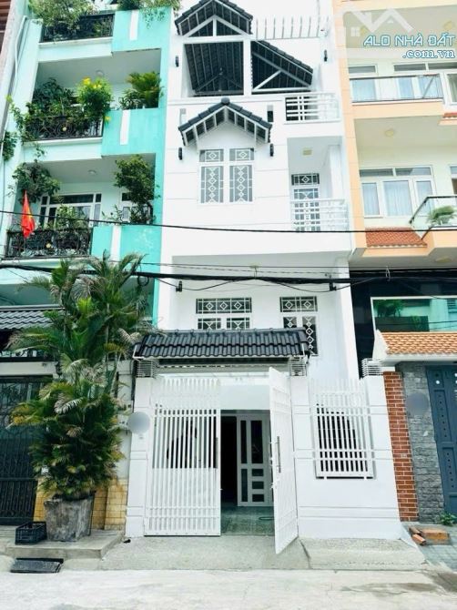 Hẻm 10m thông, 4 tầng, 4,5m x 17m, kinh doanh tốt, ngay chợ Hạnh Thông Tây, Quang Trung - 1