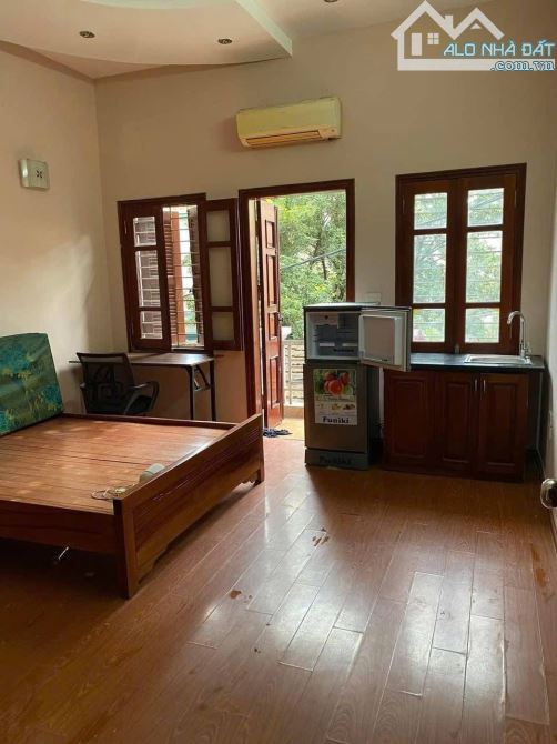 Bán nhà sổ đỏ chính chủ sát phố Trần Cung, Ô tô đỗ cửa, 9 phòng cho thuê 66m2 giá 15.6 tỷ - 1