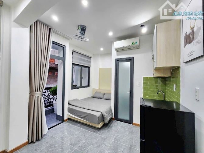 Bán tòa nhà Quận 1, 14 phòng cao cấp hẻm Lê Thánh Tôn - 1