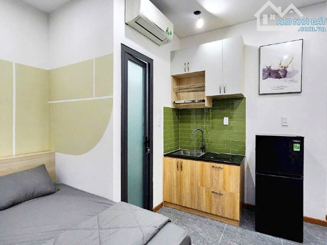 Bán tòa nhà Quận 1, 14 phòng cao cấp hẻm Lê Thánh Tôn - 3