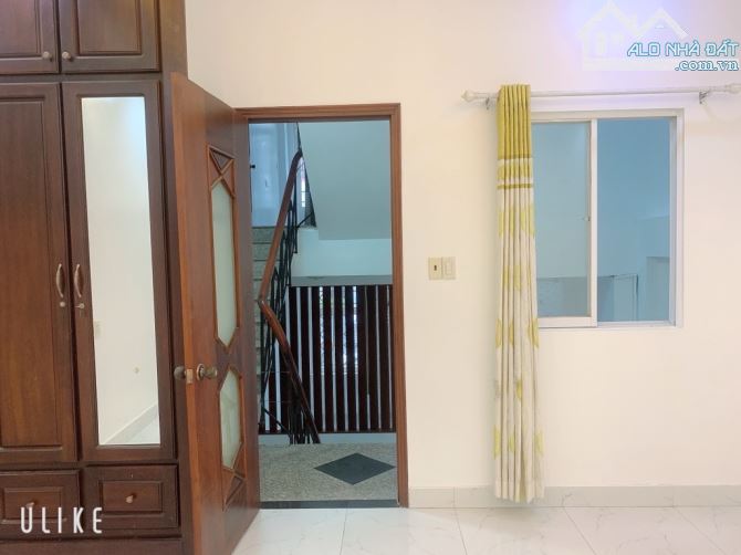 Hẻm 10m thông, 4 tầng, 4,5m x 17m, kinh doanh tốt, ngay chợ Hạnh Thông Tây, Quang Trung - 4