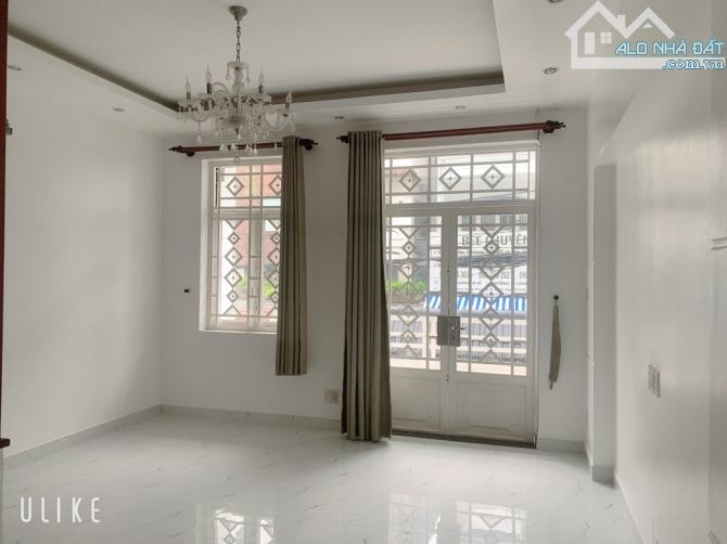 Hẻm 10m thông, 4 tầng, 4,5m x 17m, kinh doanh tốt, ngay chợ Hạnh Thông Tây, Quang Trung - 5