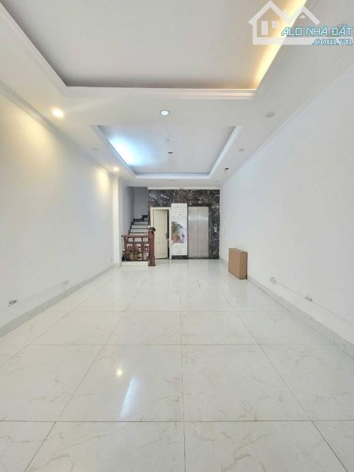 đống đa - 7 tầng thang máy - mặt ngõ thông - kinh doanh tốt - cạnh hồ  diện tích 50m2 x 7