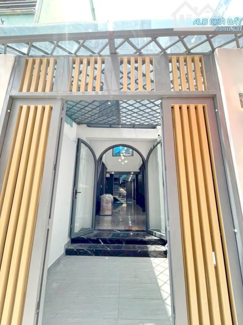 Bán nhà mới 1 lầu gần mặt tiền chợ Rạch Ông P.2 Quận 8