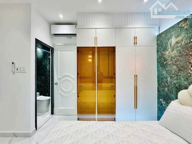 NHÀ GÒ VẤP CÓ THANG MÁY 4X16M 10,5 TỶ 5 TẦNG CÓ GARA Ô TÔ ĐƯỜNG THỐNG NHẤT P16