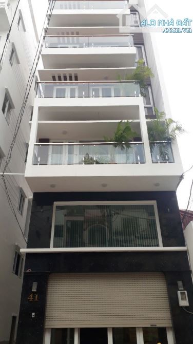 Bán Nhà Góc 2MT Bùi Văn Thêm P.9 Q.PN 5,7x17m 7 tầng, thang máy HĐT 60tr/th 24 tỷ