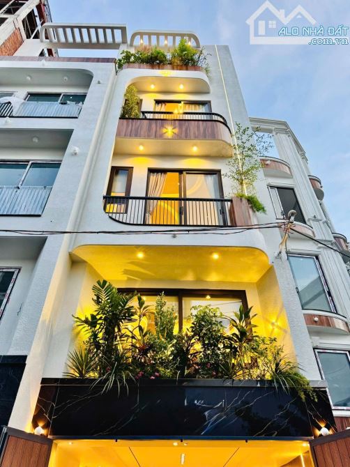 SIÊU PHẨM NHÀ PHỐ 4 TẦNG CÓ THANG MÁY - HẺM XE HƠI 8m THÔNG THOÁNG