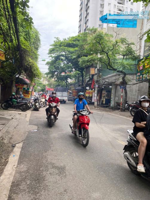 MẶT PHỐ LĨNH NAM - VỊ TRÍ ĐẮC ĐỊA KINH DOANH ĐỈNH - VỈA HÈ - DT 52M 5 TẦNG THANG MÁY