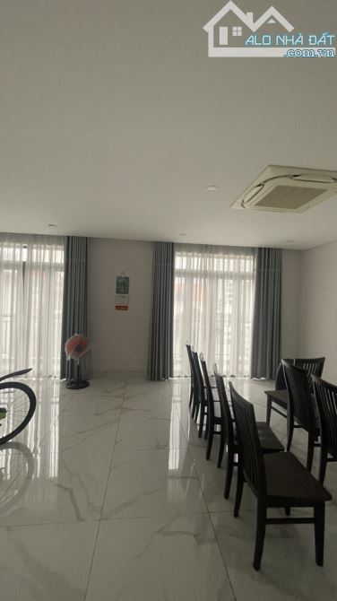 Bán tòa nhà văn phòng 5 tầng,120m 8x15 thu nhập 30 triệu