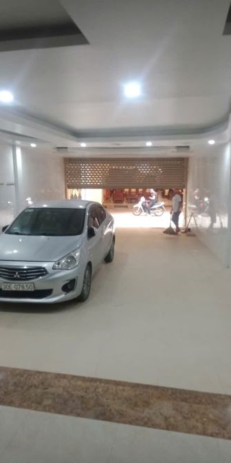 Bán tòa Nhà VP Phố Thái Hà : 120mx 6T Thang Máy , MT 6m giá 47 tỷ . Sát phố , ngõ ô tô trá - 1
