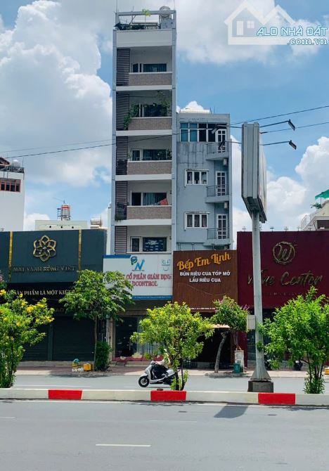 Bán tòa nhà 5 Lầu MT Nguyễn Hữu Cảnh đối diện Pearl Plaza ngay sát Q1 và Q2 - 1