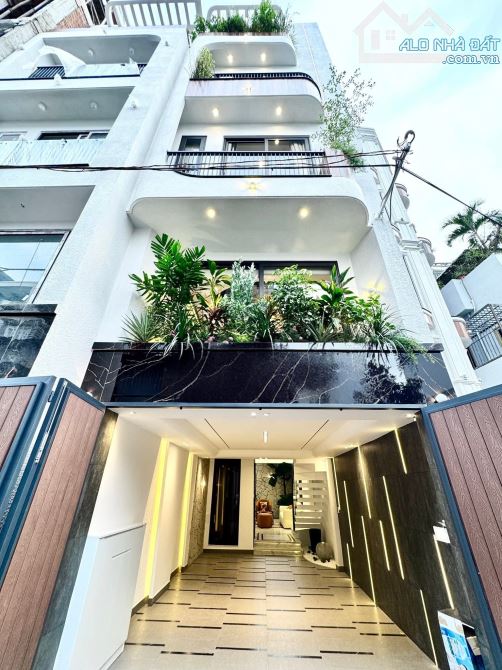 SIÊU PHẨM NHÀ PHỐ 4 TẦNG CÓ THANG MÁY - HẺM XE HƠI 8m THÔNG THOÁNG - 1
