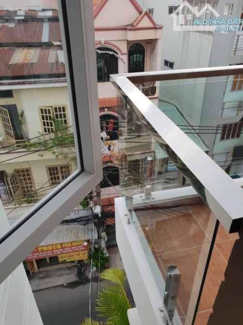 Bán Nhà Góc 2MT Bùi Văn Thêm P.9 Q.PN 5,7x17m 7 tầng, thang máy HĐT 60tr/th 24 tỷ - 12